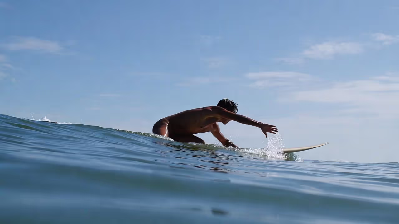 Efficient paddling starts with body position and long controlled strokes