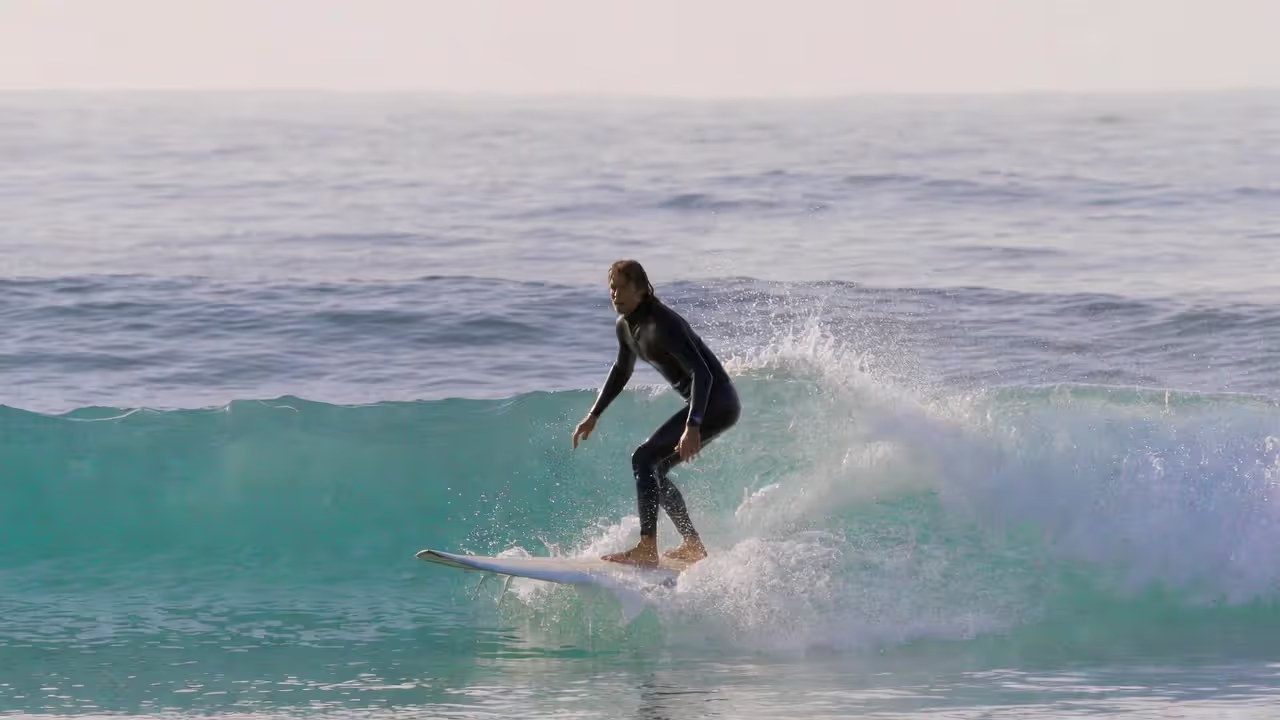 Bent knees and a stable stance create real balance on the board